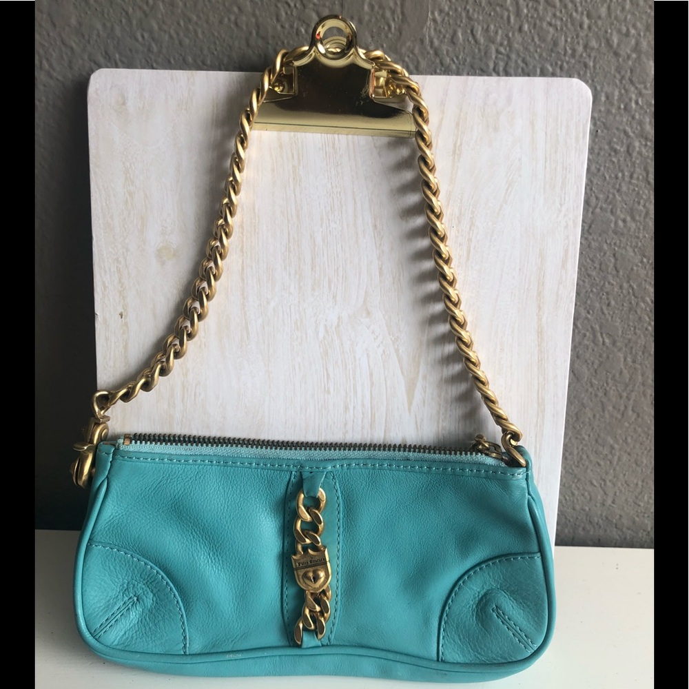 Adorable turquoise Juicy purse.